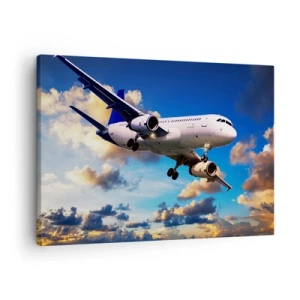 Quadro em tela - Um avião de passageiros contra as nuvens ao pôr do sol - 70x50cm - Viagem em branco e azul - Decoração de parede moderna para a sala de estar e quarto ARTTOR