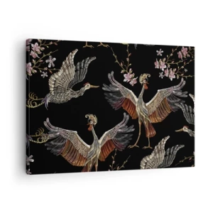 Quadro em tela - Guindastes e flores elegantes em um fundo preto - 70x50cm - O pássaro de conto de fadas - Decoração de parede moderna para a sala de estar e quarto ARTTOR