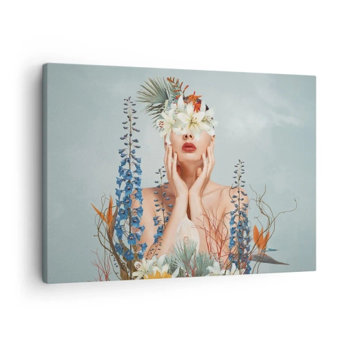 Quadro em tela - Retrato de uma mulher com um motivo floral sobre um fundo azul - 70x50cm - Mulher – flor - Decoração de parede moderna para a sala de estar e quarto ARTTOR