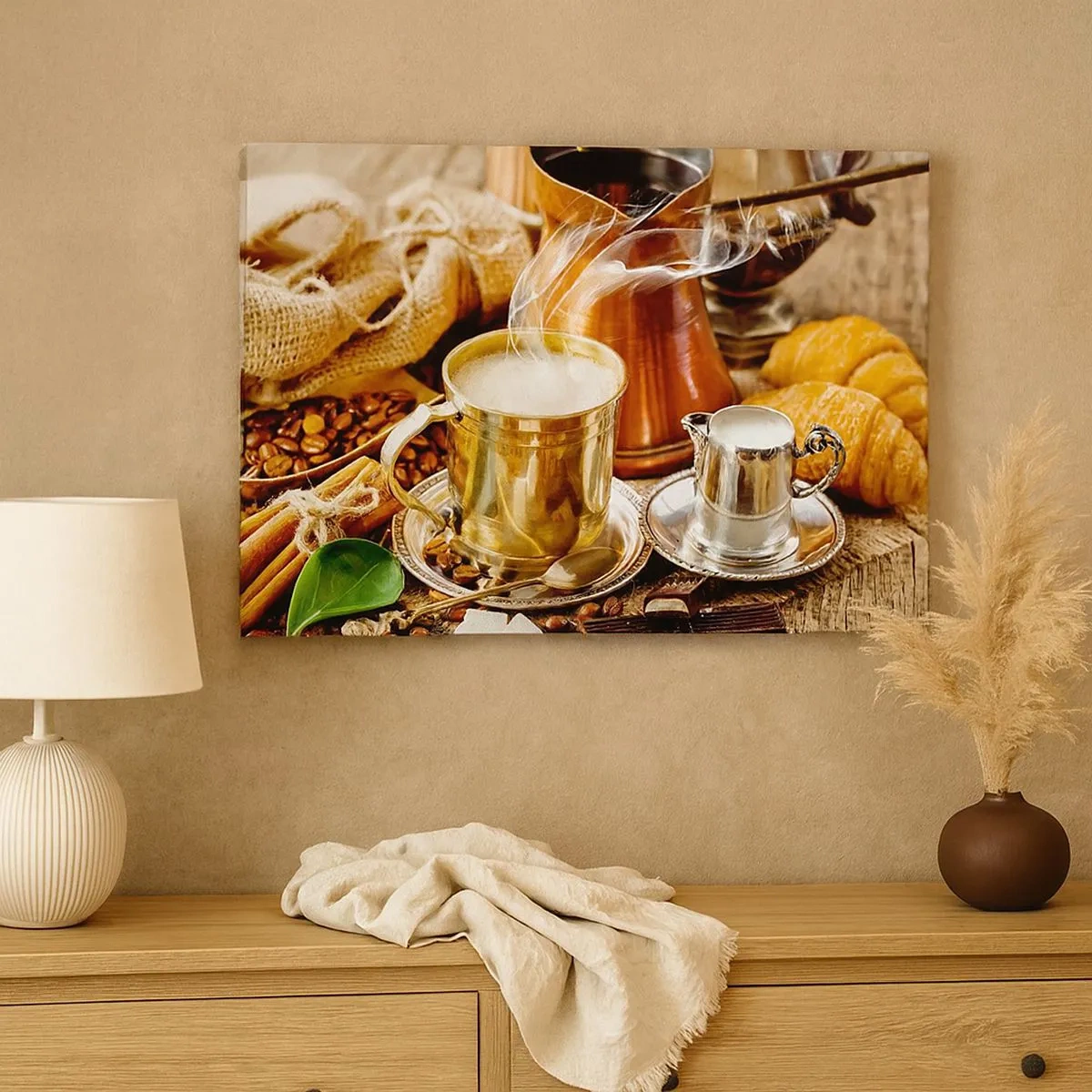 Quadro em tela - Uma caneca dourada de café cercada por grãos, jarras e croissants - 70x50cm - Bons dias! - Decoração de parede moderna para a sala de estar e quarto ARTTOR