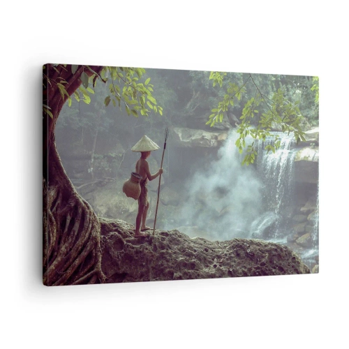 Quadro em tela - Uma figura com uma lança em uma cachoeira em uma floresta tropical - 70x50cm - Amigo da natureza - Decoração de parede moderna para a sala de estar e quarto ARTTOR