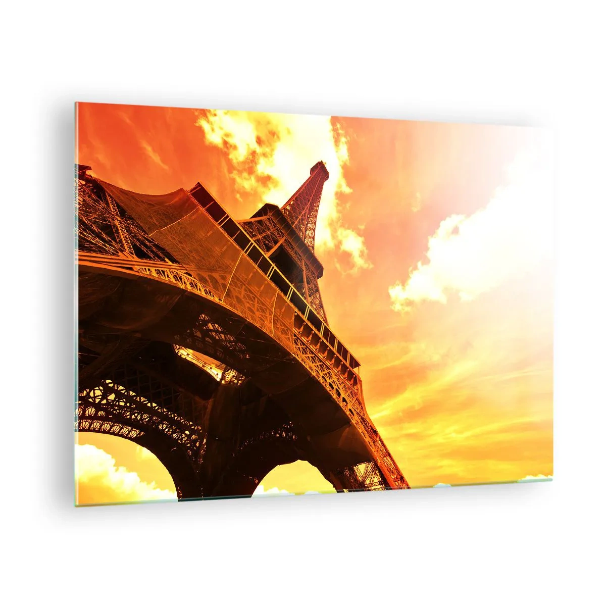 Quadro em vidro - A Torre Eiffel em tons quentes de laranja ao pôr do sol - 70x50cm - Monumental, dourada pelo sol - Decoração de parede moderna para a sala de estar e quarto ARTTOR