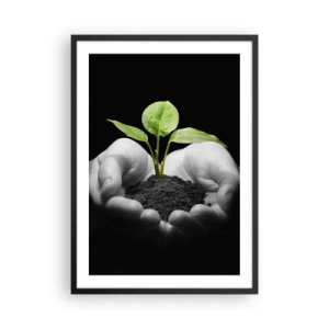 Pôster com moldura preta - Uma planta nas mãos simbolizando a vida e a natureza - 50x70cm - Eu amo a natureza, eu a protejo - Decoração de parede moderna para a sala de estar e quarto ARTTOR