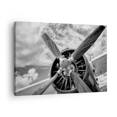 Quadro em tela - Uma foto em preto e branco de uma hélice de avião contra um céu dinâmico. - 70x50cm - O conquistador dos céus - Decoração de parede moderna para a sala de estar e quarto ARTTOR