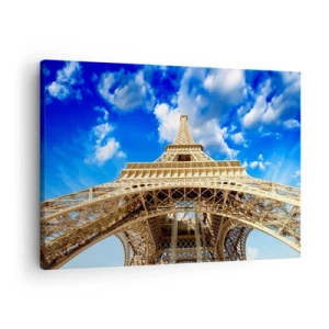 Quadro em tela - A Torre Eiffel vista de baixo contra um céu azul - 70x50cm - Alcançando o céu e as nuvens - Decoração de parede moderna para a sala de estar e quarto ARTTOR