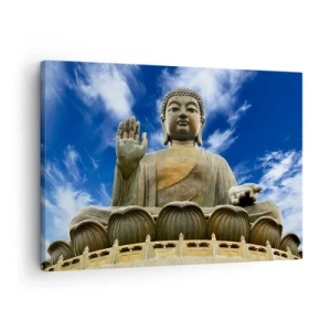 Quadro em tela - Uma estátua monumental de Buda contra um céu azul com nuvens - 70x50cm - Viva sem medo - Decoração de parede moderna para a sala de estar e quarto ARTTOR