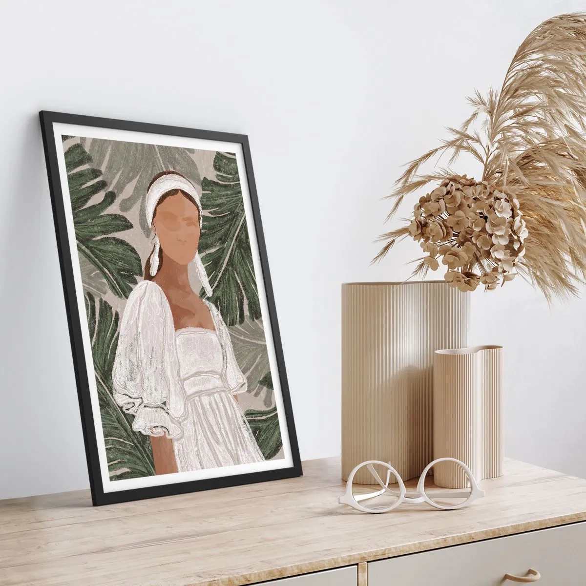 Pôster com moldura preta - Uma mulher de vestido branco sobre um fundo de folhas verdes - 50x70cm - Retrato exótico - Decoração de parede moderna para a sala de estar e quarto ARTTOR