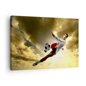 Quadro em tela - Um jogador de futebol em um salto dinâmico chutando a bola contra o céu - 70x50cm - O céu do futebol - Decoração de parede moderna para a sala de estar e quarto ARTTOR