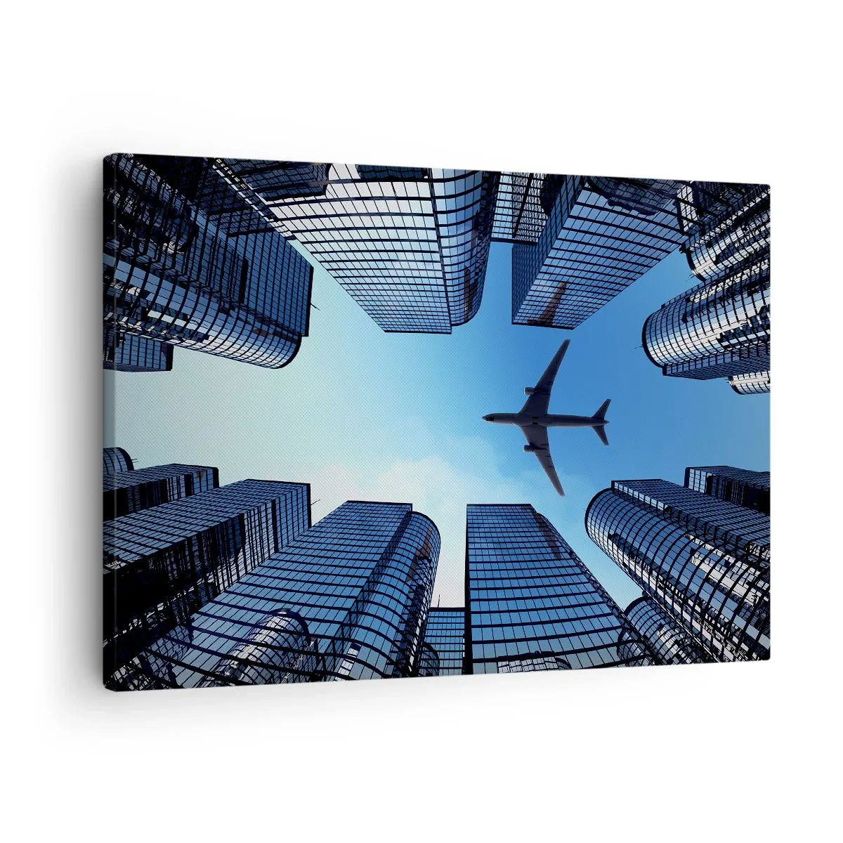 Quadro em tela - Um avião voando sobre arranha-céus modernos no centro da cidade. - 70x50cm - Vista do desfiladeiro de vidro - Decoração de parede moderna para a sala de estar e quarto ARTTOR