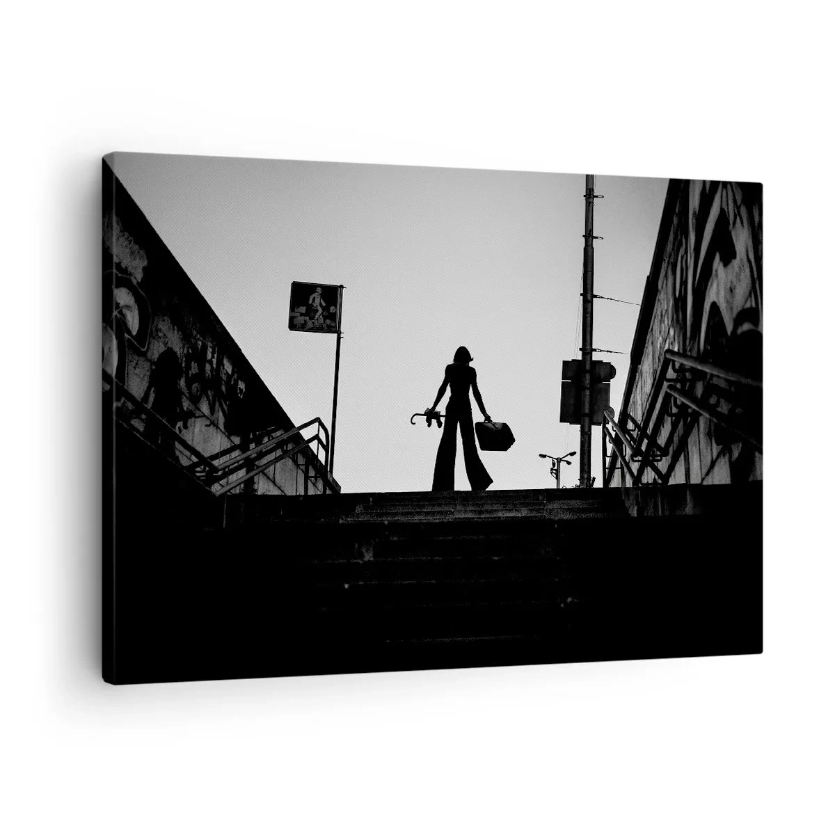 Quadro em tela - Uma figura feminina na escada em preto e branco com uma atmosfera dinâmica - 70x50cm - Caminhadas urbanas - Decoração de parede moderna para a sala de estar e quarto ARTTOR