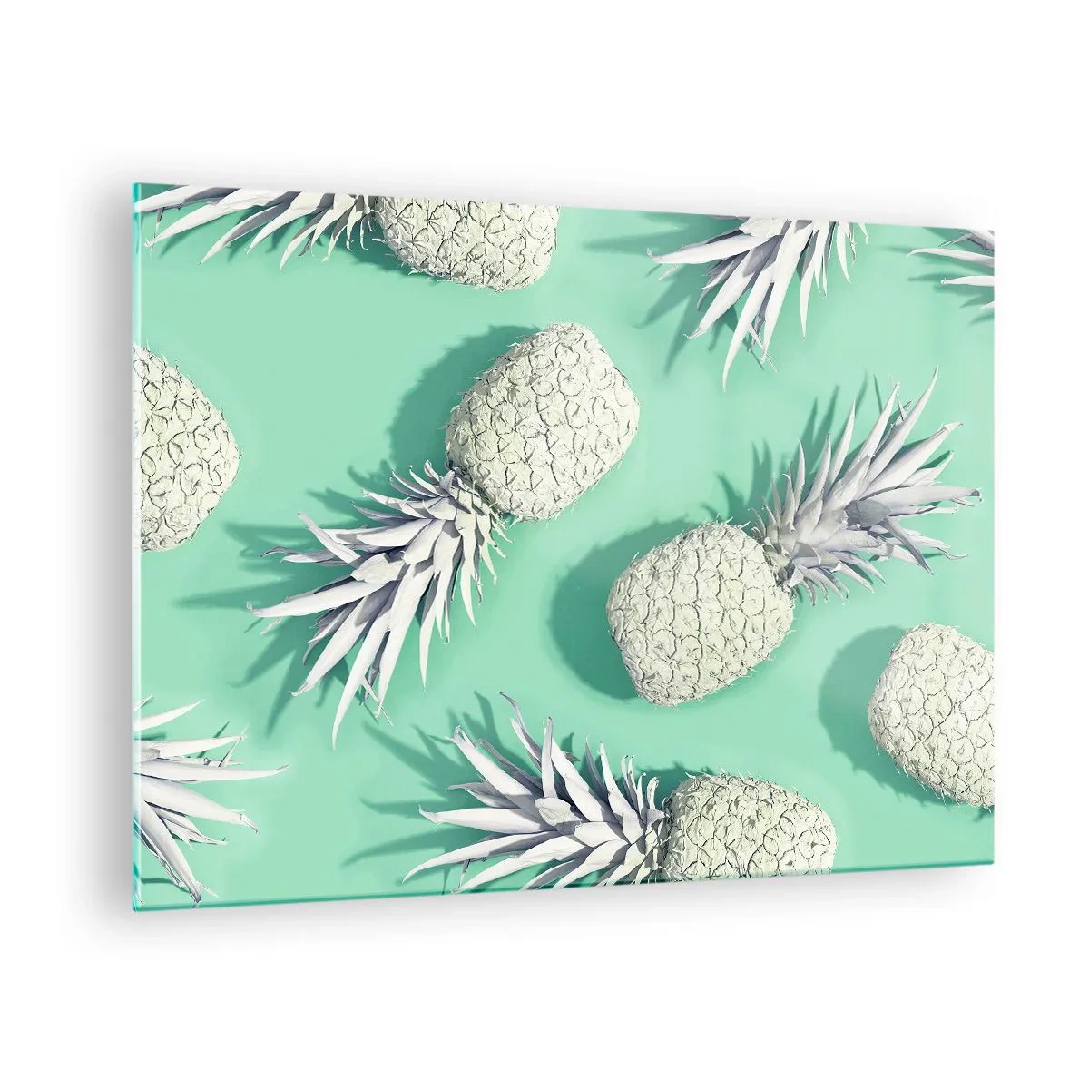 Quadro em vidro - Abacaxis brancos sobre fundo de menta em uma composição artística - 70x50cm - Vão muito bem com a hortelã - Decoração de parede moderna para a sala de estar e quarto ARTTOR