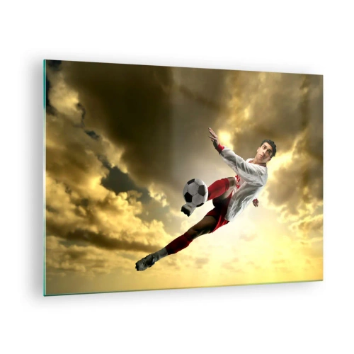 Quadro em vidro - Um jogador de futebol em ação contra um céu dourado - 70x50cm - O céu do futebol - Decoração de parede moderna para a sala de estar e quarto ARTTOR