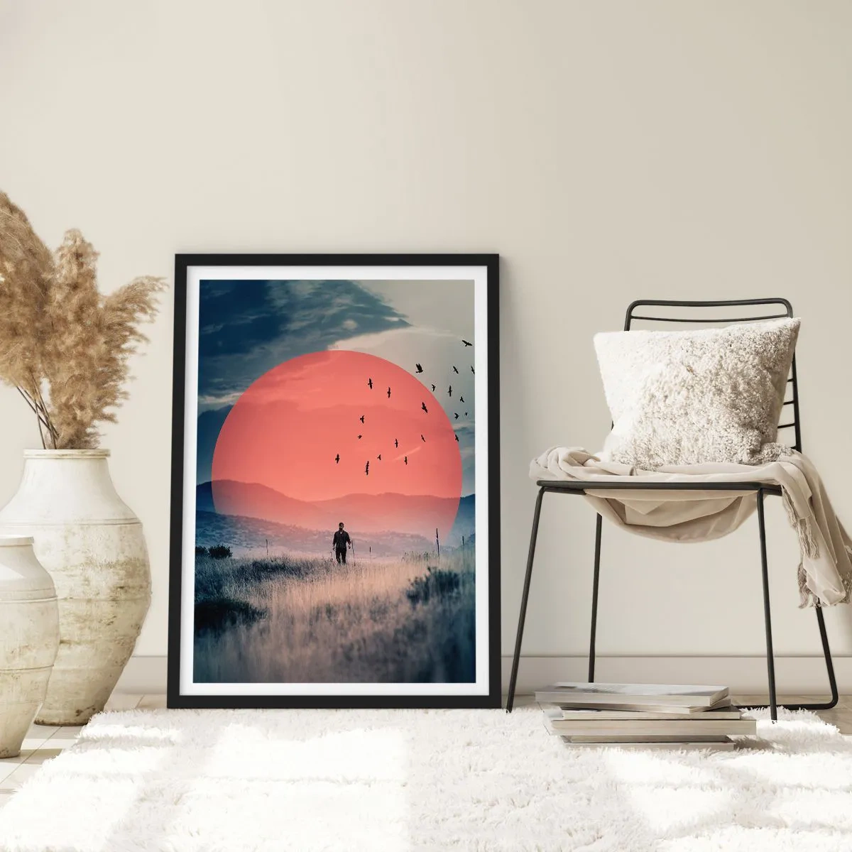 Pôster com moldura preta - Um homem caminhando por um campo contra um sol vermelho - 50x70cm - Em casa - Decoração de parede moderna para a sala de estar e quarto ARTTOR