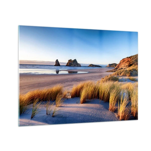 Quadro em vidro - Uma praia ao amanhecer com grama e pedras ao fundo e um mar calmo - 70x50cm - Para quem busca a paz - Decoração de parede moderna para a sala de estar e quarto ARTTOR